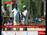 அதிகாரிகள் ஒருதலைபட்சமாக செயல்படுவதாக கூறி கோட்டாச்சியர் அலுவலகத்தில் முதியவர் தீக்குளிக்க முயற்சி