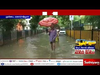 மும்பையில் பெய்த கனமழையால் பதினைந்து வயது சிறுவன் உட்பட நான்கு பேர் உயிரிழந்துள்ளனர்