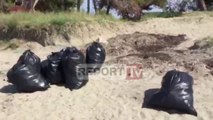 “Të fala nga Zvërneci”, vlonjatët pastrojnë plazhin dhe i lenë qeset tek dera e Dritan Lelit