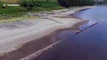 UK heatwave reveals ruins of former village in Cumbria reservoir