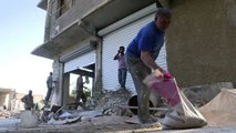 Street by street, gutted Syrian town begins reconstructio