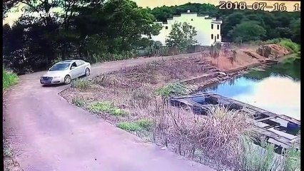 Driver forced to swim back to shore after reversing into reservoir