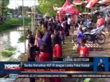 Lomba Renang di Sungai Banjir Kanal Timur Meriahkan HUT RI