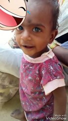 Cute baby smiling listening song