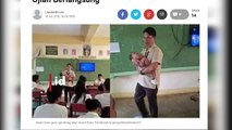 Viral! Guru Laki-laki SMA Gendong Bayi Saat Mengajar di Depan Kelas
