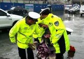 Local Police Assist Civilians in Flooded Lanzhou