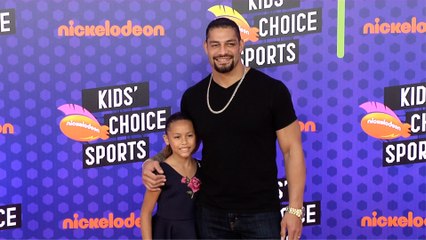 Roman Reigns and JoJo Anoa'i 2018 Kids' Choice Sports Awards Orange Carpet