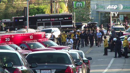 One dead, suspect surrenders after US supermarket hostage drama