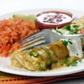 These GREEN CHILE CHICKEN SMOTHERED BURRITOS are a seriously delicious way to satisfy your craving for Mexican food. Simple ingredients, easy prep, incredible r