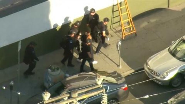 Murder suspect in L.A. hostage standoff named