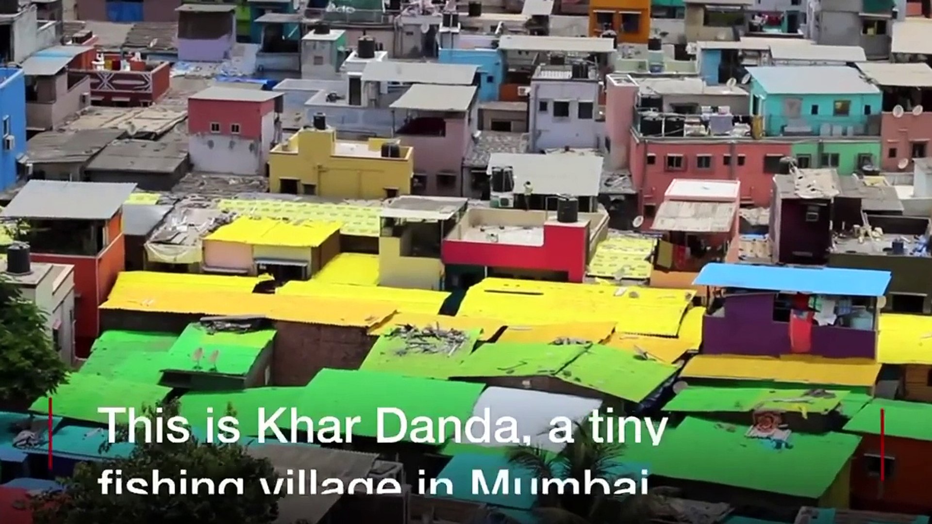 Mumbai slum gets colourful makeover - BBC News