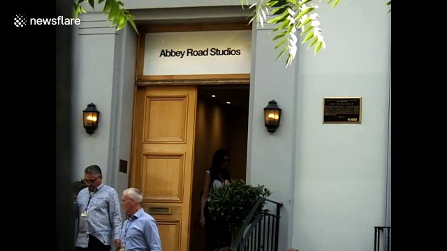 Paul McCartney leaves Abbey Road Studios after secret concert for fans and celebrities