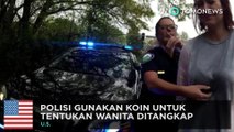 Polisi gunakan koin untuk tentukkan penangkapan - TomoNews