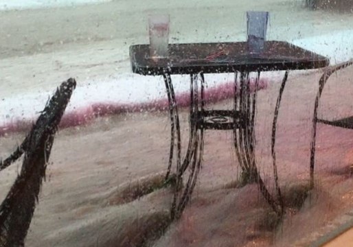 Flash Flood Sweeps Away Table and Chairs in Manitou Springs, Colorado