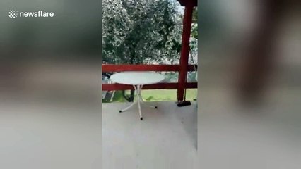 Thick grey smoke envelops mountains near resort town of Kineta