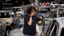 Greece fires: Twenty-six people found dead hugging each other in a field