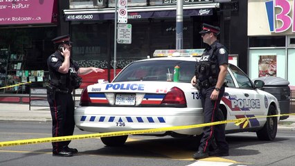 Local residents pay respects at scene of Toronto shooting