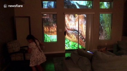 Dad uses projectors to create real-life 'Jurassic Park' for daughter, 7