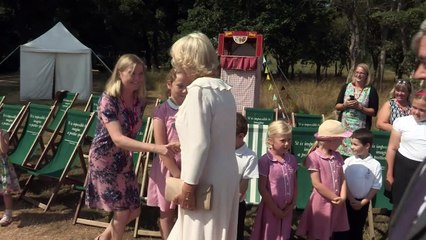 Camilla and Dame Judi Dench eat ice-cream at Osborne House