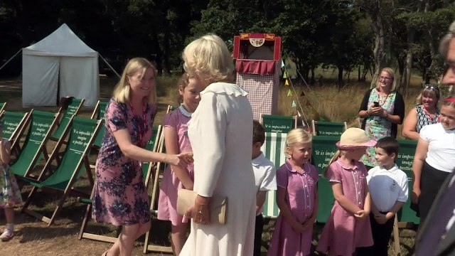 Camilla and Dame Judi Dench eat ice-cream at Osborne House