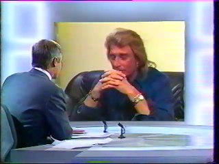 Johnny Hallyday - Au Journal TV de France 2 pour la conclusion de sa tournée d'hiver 95.