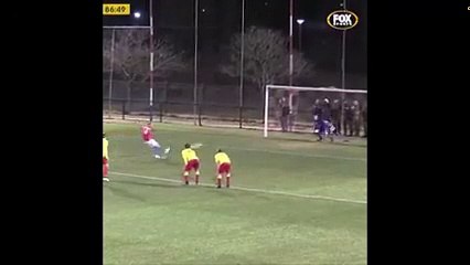 A player gets his penalty saved, hits crossbar on the rebound and than blacks the goal!