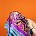 Creative ways to tie scarves and sarongs. 