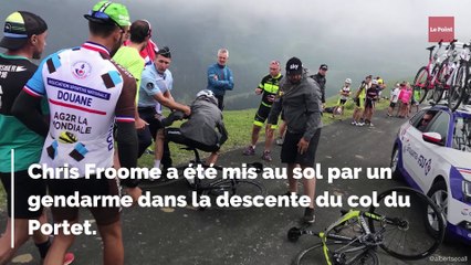 Chris Froome mis au sol par un gendarme