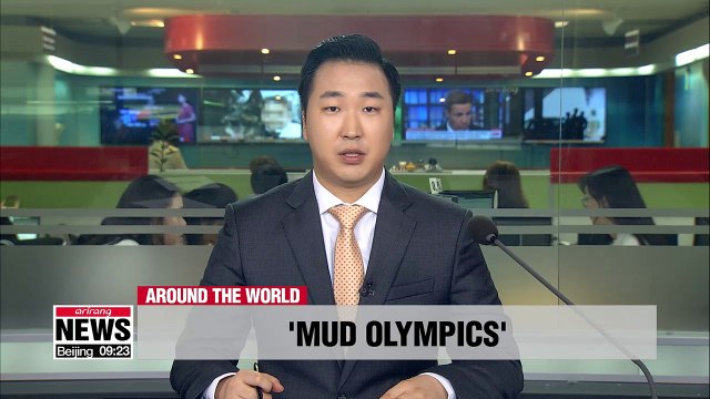 Thousands gather in northern Germany for Mud Olympics to raise money for cancer patients