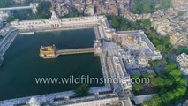 Fly over Amritsar- Golden Temple  old city railway station and trains from the air