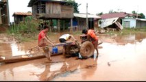 Laos dam collapse: Water levels slowly receding