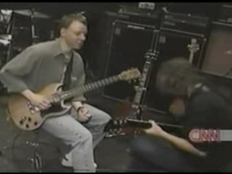Acdc - Cnn On The Auction For A Guitar Lesson With