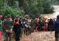 Thai Rescue Workers Help Victims of Laos Flooding Following Dam Collapse