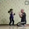 a  father  beatting during a boxing entertainment by his daugther