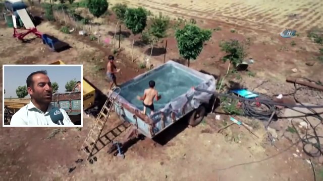 Çocukları Sıcaktan Bunalan Baba Römorku Havuza Çevirdi
