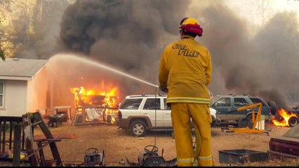 Two children killed as California wildfire rages on