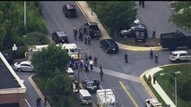 Annapolis newspaper shooting- Video shows police at scene - BBC News