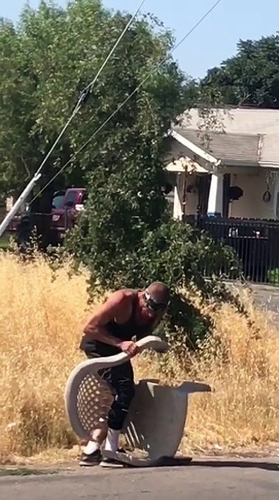 Man vs. Broken Chair