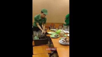 The Funny Server Drops Tub of Plates From Chair