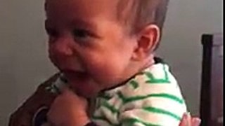 Newborn laughing out loud