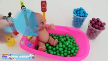Learn Colors Baby Doll Bath Time Playing with Disney Candy Pez and Gumballs