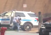 Bystanders Help Police Officer After Crash in Unfiltered View of Police-Community Relations in Chicago