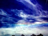 Rare rainbow appears in the blue sky and white clouds by Lonny Frost 5-17-2013 Part 1
