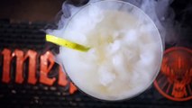 Dry ice in a cocktail glass emitting fog clouds. Free HD video footage