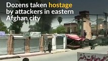 Gunmen storm government building in Afghanistan, taking dozens hostage
