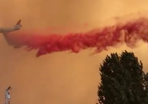 Firefighters Make Air Drop Over California's River Fire