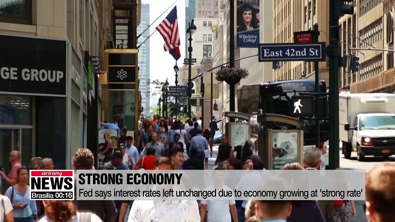 Fed holds interest rates, says economy is growing at a 'strong' pace