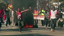 Zimbabwe awaits vote results after troops fire on protesters
