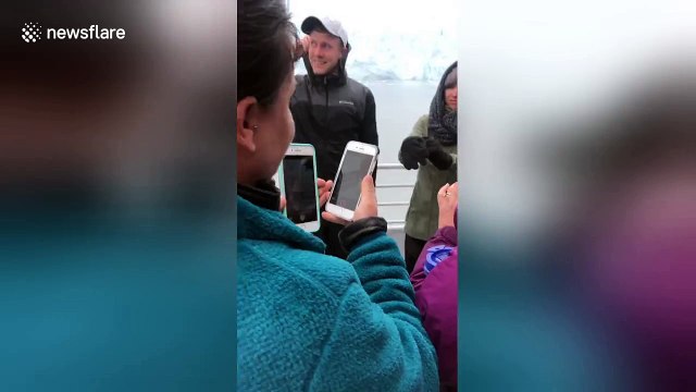 Man surprises girlfriend with proposal in front of Alaska glacier