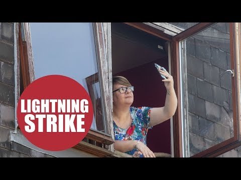 Women's phone was struck by a bolt of lightning as she tried to film a thunderstorm